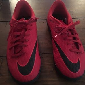 Size 2 red Nike soccer cleats